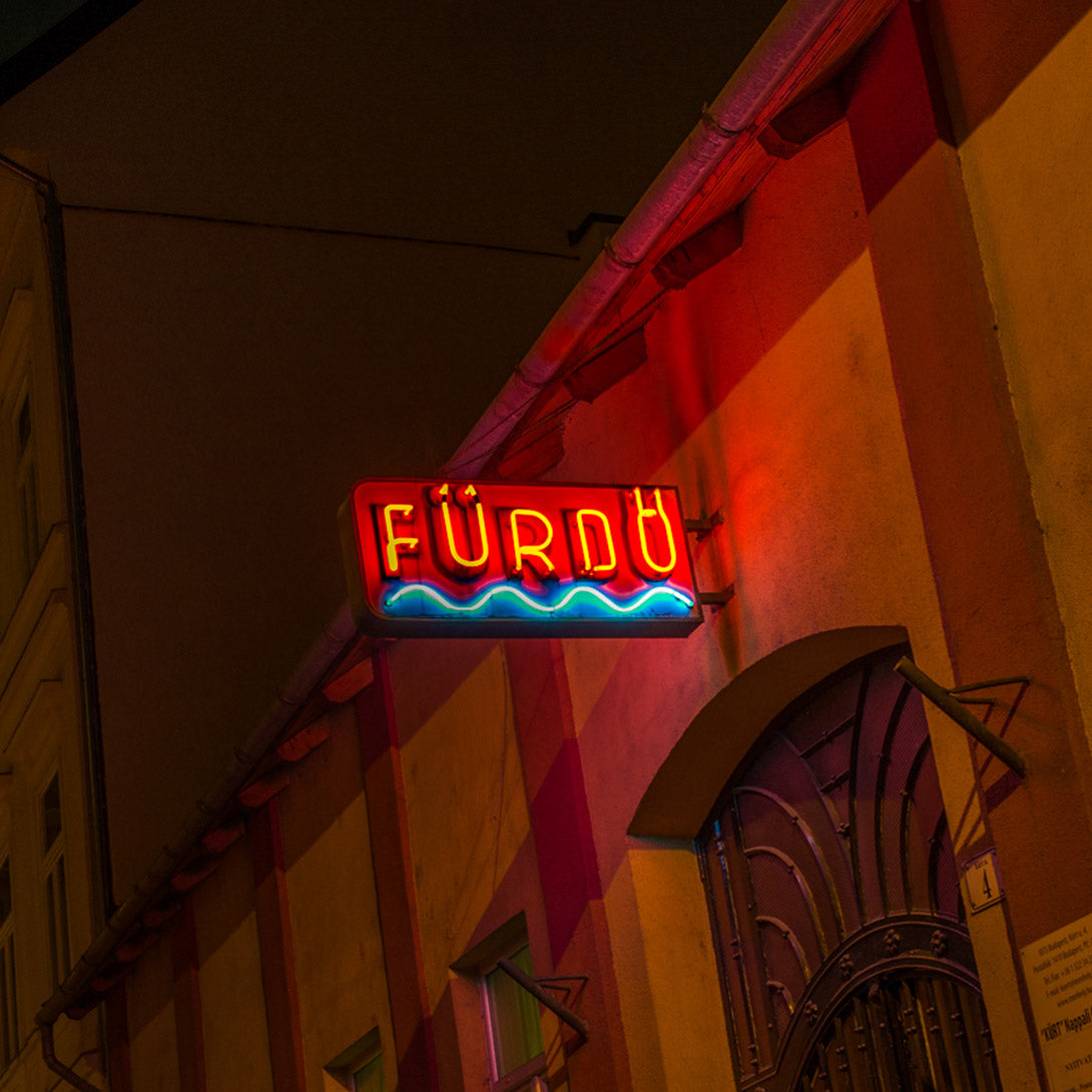 The renovation of Fürdő neon sign